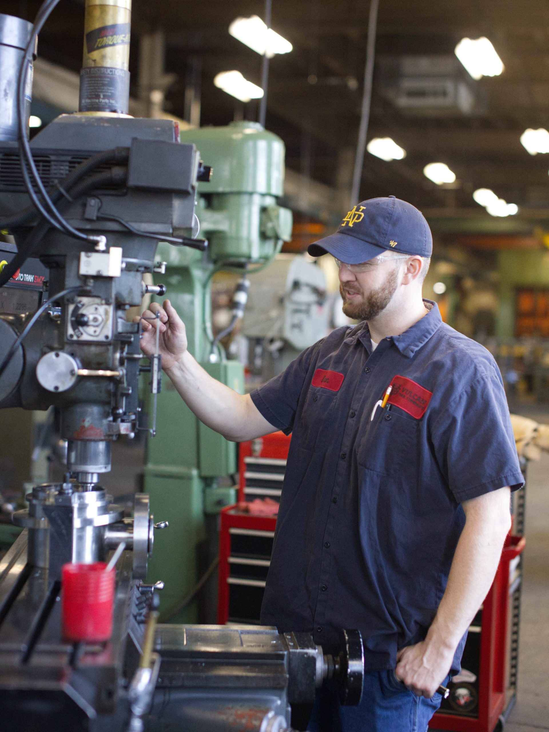Skilled Operator Manually Machining a Component Skilled Operator Manually Machining a Component